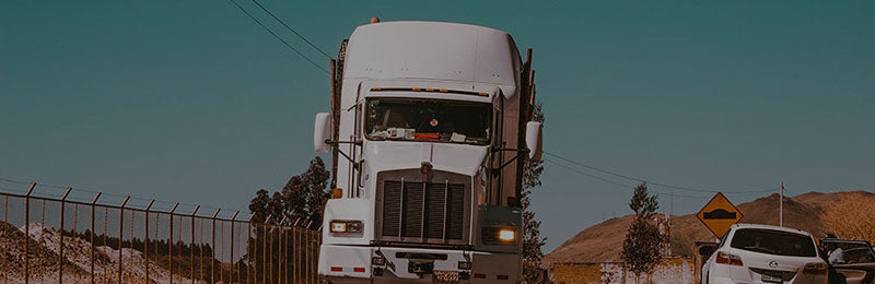 Trucker using iCloth wipes to clean touchscreen in cab